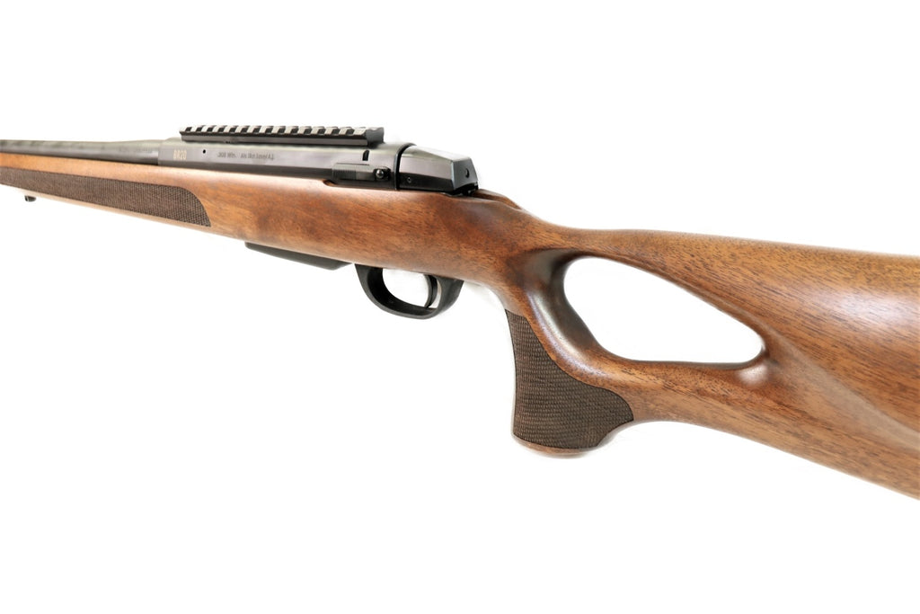 Brenner Jagdgewehr mit Holzschaft.